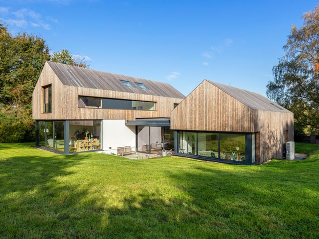 An exterior view of the Kebony-clad new family home in Braishfield, Hampshire.