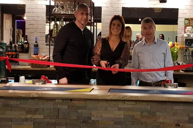 Manchester United legends Jaap Stam (left) and Denis Irwin with Kirsty Stanley