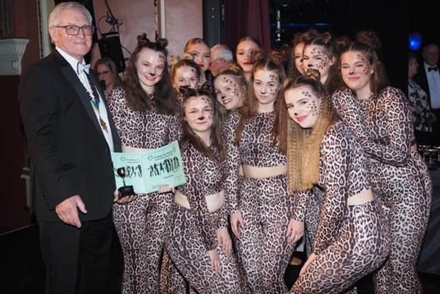 Dancemania Dance Troupe (15-18) were runners up after performing a scene from The Lion King. Here is the group pictured with Rotary President, Kelvin Bowman.