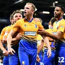 Neal Bishop celebrates scoring for Mansfield Town against West Brom in the Carabao Cup second round in 2018.  (Photo by Clive Mason/Getty Images)