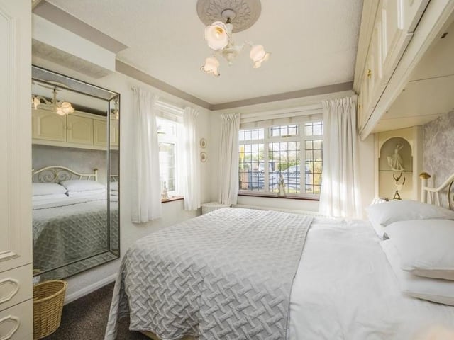 This is the smallest bedroom of the three at the Longdale Avenue bungalow, but it is still an alluring space, oozing comfort. Again, it includes fitted furniture and a carpeted floor, while the windows face the front and side of the property