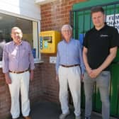 From left, Mansfield Harriers secretary David Lisgo, Rotarian John Whiteley, and Bobby Thorpe, of Thorpe Electrical Solutions, with the defibrillator.