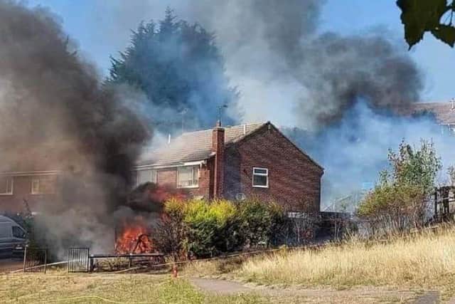 The fire rages in Forest Town last Saturday, putting properties on Maunleigh at risk.