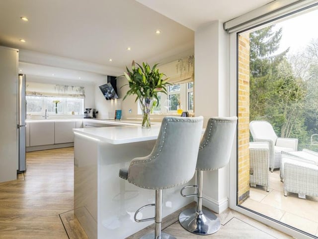 A good-sized peninsula adds to the appeal of the bright and contemporary kitchen/breakfast room