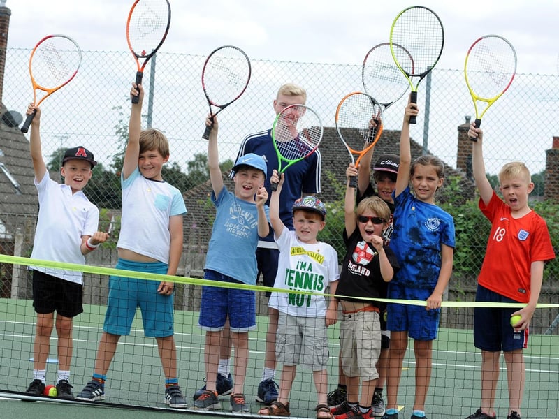 Coach Euan Burgess with some of the youngsters who attended a previous open day session at the Mansfield Lawn Tennis Club.