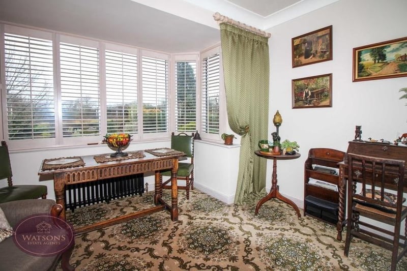 The place mats are set and it will soon be time for dinner by the bay window, offering views of the back garden. This is the charming dining room at the £425,000 property.