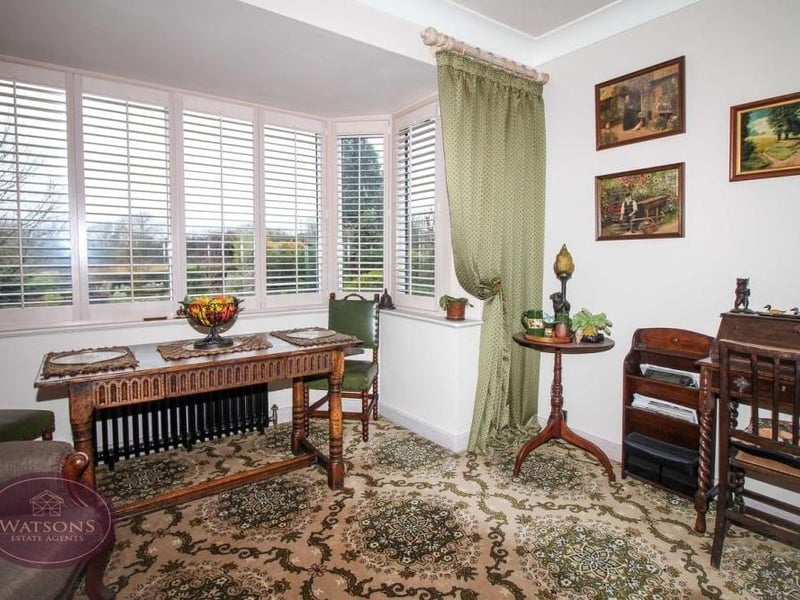 The place mats are set and it will soon be time for dinner by the bay window, offering views of the back garden. This is the charming dining room at the £425,000 property.