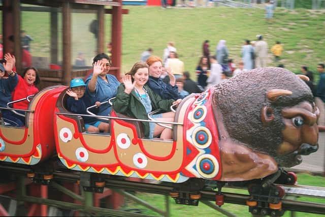 Visitors enjoying the Buffalo Stampede ride at The American Adventure.