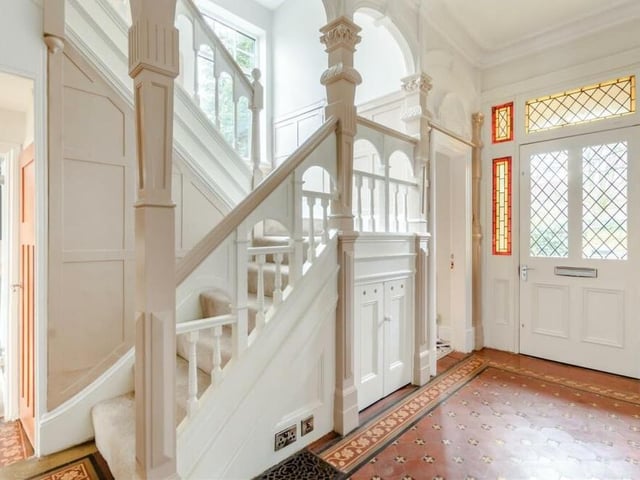 As you step through the front door, you are greeted by this elegant entrance hall, in which many character features have been retained and restored. They include the original tiled floor and coving to the ceiling. Other assets include painted panelled walls and a dog-leg staircase rising to the first floor.