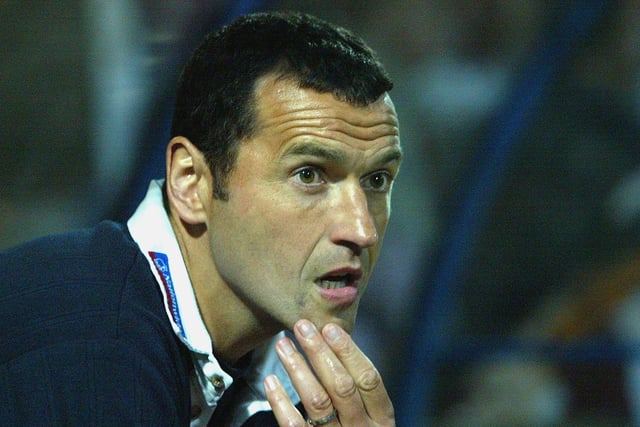 Cobblers boss and ex-Stag Colin Calderwood waits anxiously before the penalty shoot out.