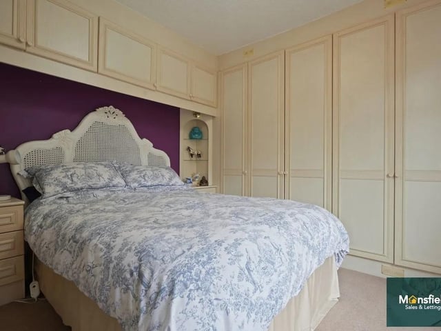 The bedrooms enjoy an abundance of built in storage.