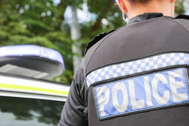 Police are appealing for information after a Kirkby house window was smashed with a paving slab