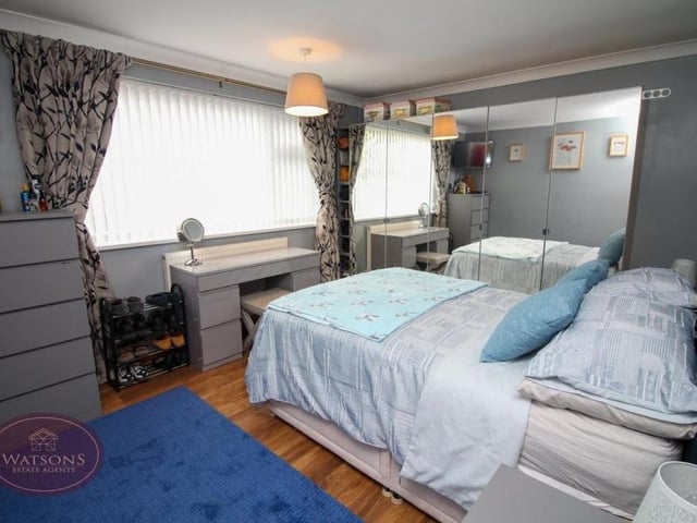The three bedrooms at the Coppice Drive property are all lined up at the back of the bungalow. Here is the largest, a double that has plenty of space for wardrobes, storage and bedroom furniture. There is a wood-effect, laminated floor.