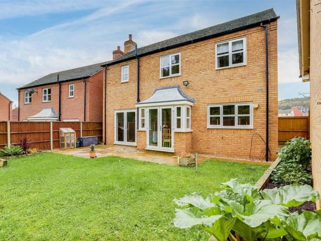 This is how the back of the £325,000 Annesley property looks. You can see the two sets of double French doors that lead out to the garden from the living room and the kitchen diner.