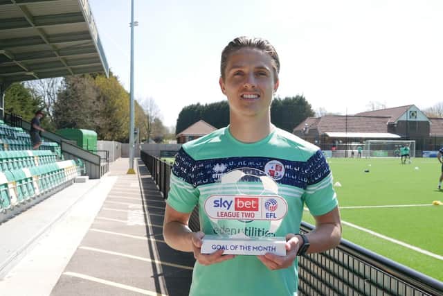 Tom Nichols with his award.