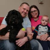 Amy Stones is walking 10,000 steps a day to raise money for Brain Tumour Research, Amy is pictured with husband Adam, Son Lucas, and Chester the dog