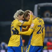 Will Swan is congratulated on his goal during the Sky Bet League 2 match against Tranmere Rovers FC at the One Call Stadium, 28 Nov 2023.   
Photo credit Chris & Jeanette Holloway, The Bigger Picture.media