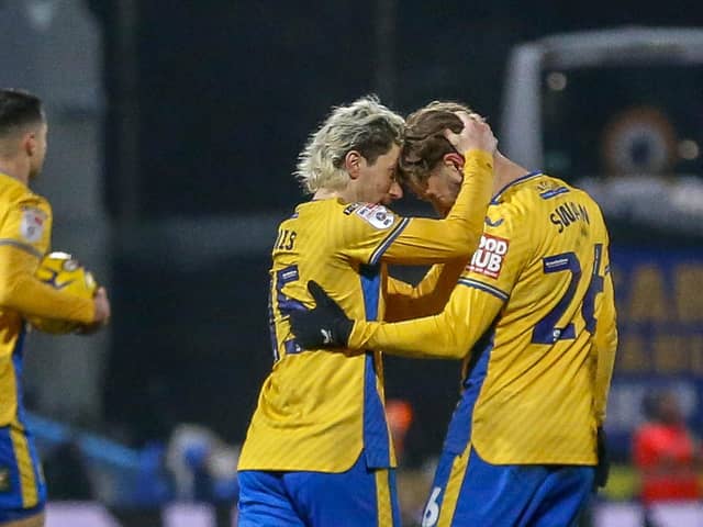 Will Swan is congratulated on his goal during the Sky Bet League 2 match against Tranmere Rovers FC at the One Call Stadium, 28 Nov 2023.   
Photo credit Chris & Jeanette Holloway, The Bigger Picture.media