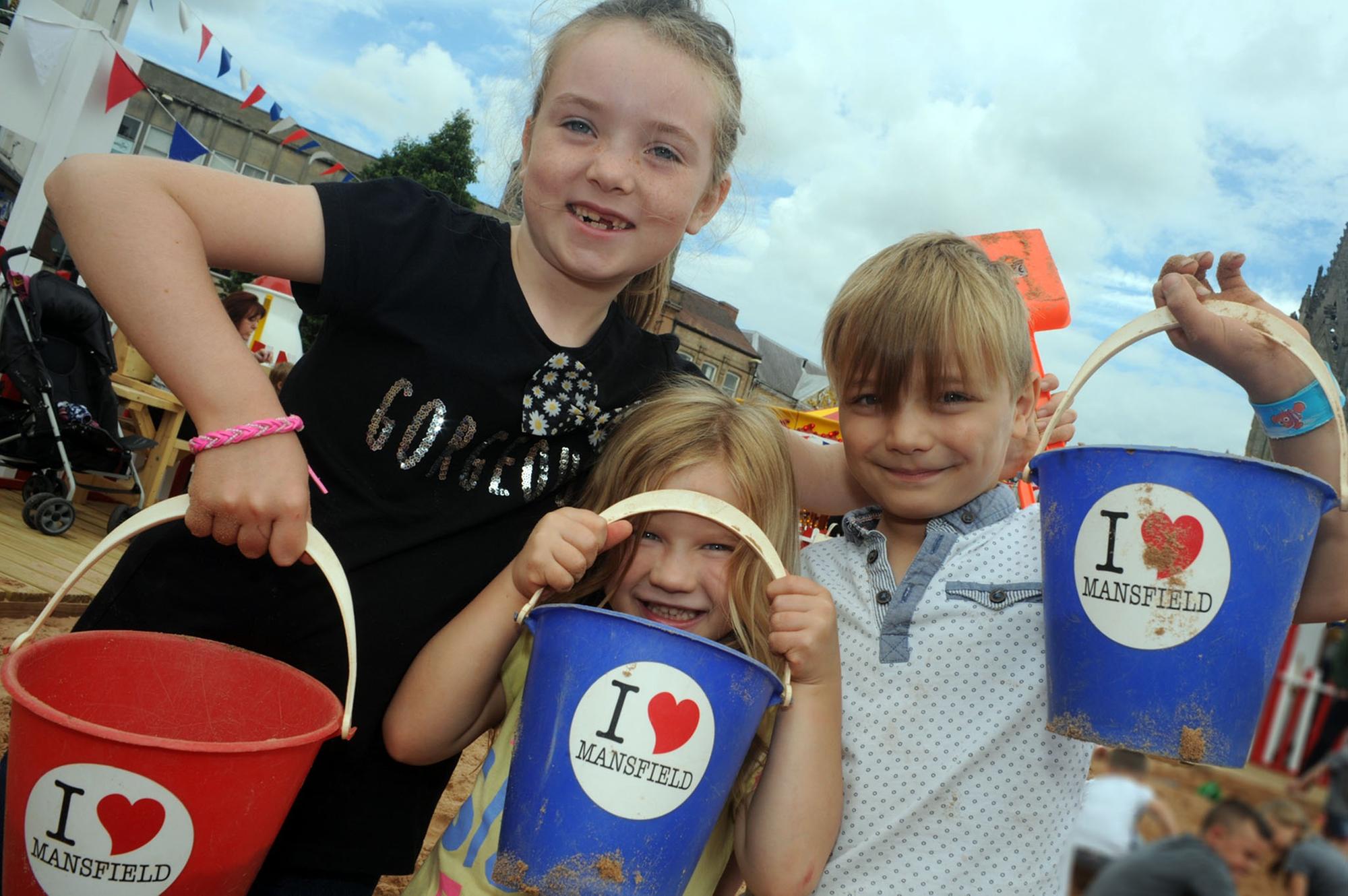 Evan and Evie Reid with their friend Madison Brunt love the beach on Mansfield Market Place
