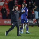 Mansfield Town manager Nigel Clough celebrates victory at Salford City.