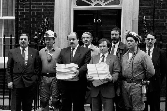 Mansfield Chad editor Jeremy Plews, fourth right, and Worksop Guardian Editor George Robinson, third left,  pictured outside No 10  with the petition of over 136,000 names Pictured from the left are Alan Meale,  Steve Cornish, Dennis Skinner, Paddy Tipping, Alan Parr and Chad's Political Editor Mark Hibbert.