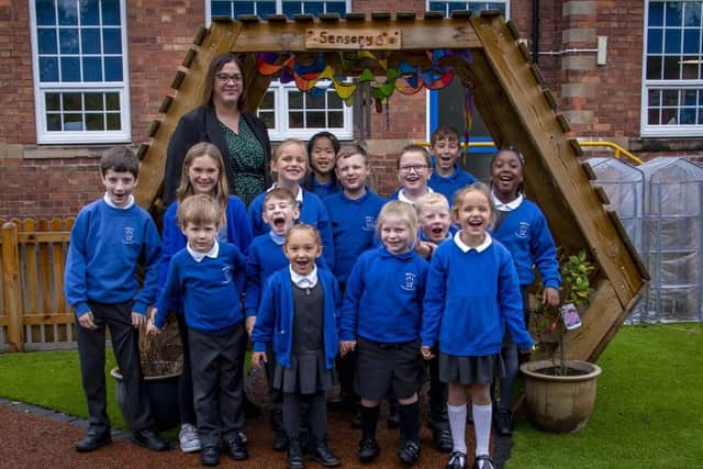 Children at Bilsthorpe Flying High Academy celebrate after the school's latest praiseworthy Ofsted report. (PHOTO BY: Lou Brimble)