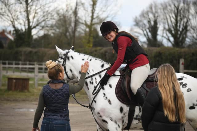 Anita Marsh smiles after managing to stay on board! Photo: Victoria Adams Photography