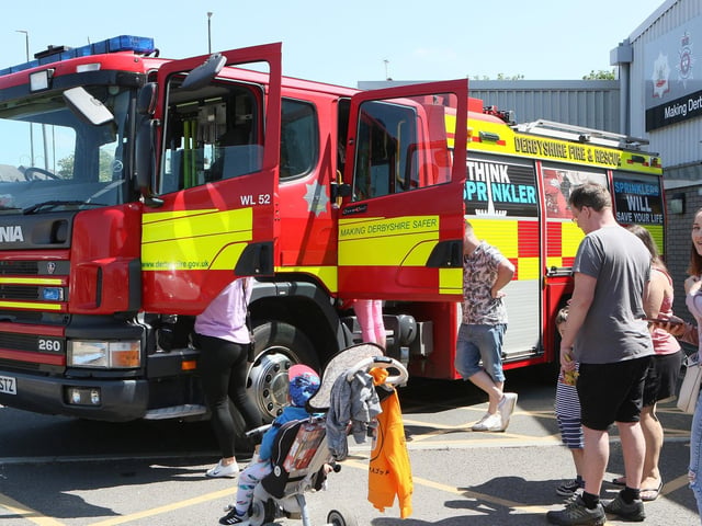 Visitors looking over the fire engine.