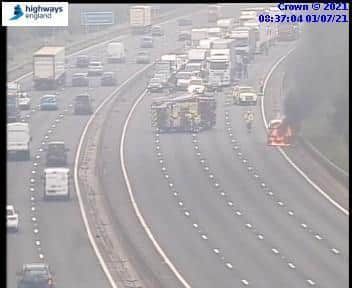 This picture from Highways England shows firefighters at the scene of the blaze.