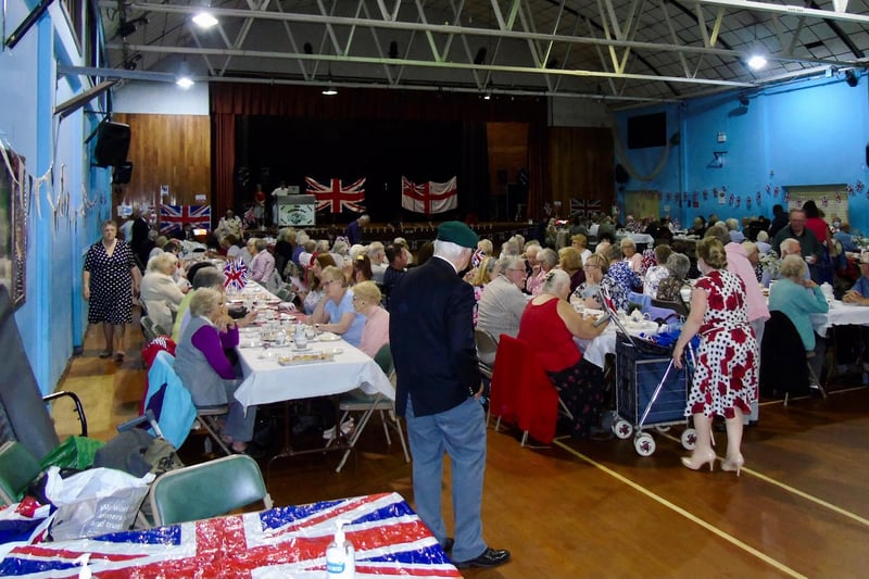Guests were seated at long tables in a nod to the street parties of the forties