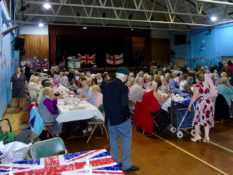 Guests were seated at long tables in a nod to the street parties of the forties