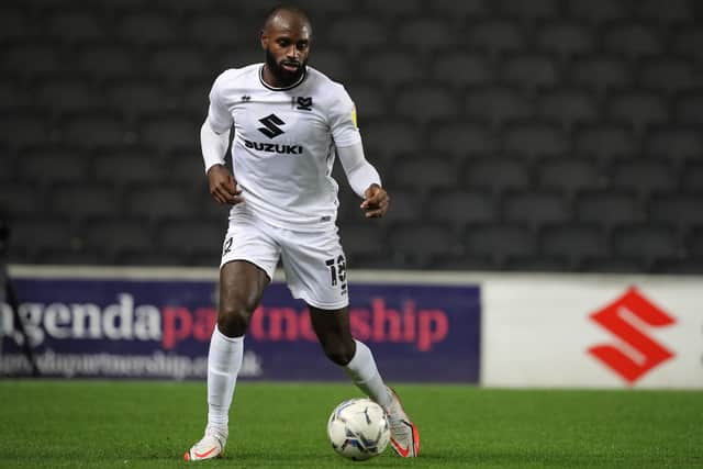 Hiram George has signed a two year deal with Mansfield Town.