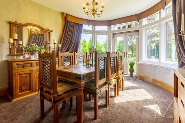 The delightful dining room at the £650,000-plus property is distinguished by its stunning, large bay window and also French doors that lead to the back garden.
