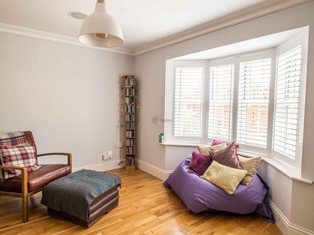 The dining room, which is currently being used as a snug, is at the front of the property. A large bay window overlooks the driveway.