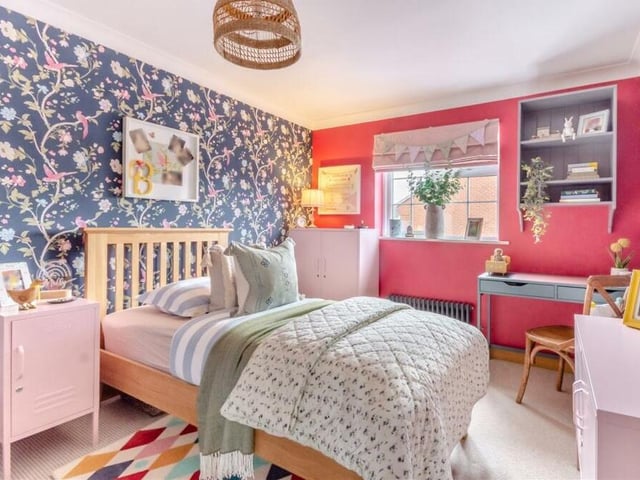 Bedroom number two on the first floor is a pleasant space. It faces the back of the Sutton property, and features include a cast-iron anthracite radiator and coving to the ceiling.