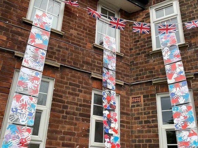The handprints were draped over the front of the school.