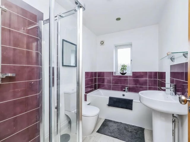 The property boasts a stylish family bathroom.