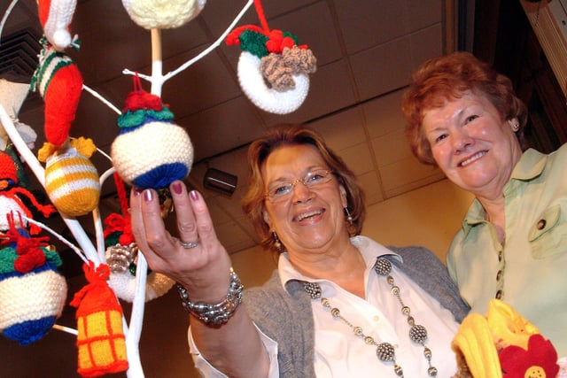 Dorothy Sharpe and Sheila Elliott on the John Eastwood Hospice stall, pictured at the Christmas 2009 market held in Mansfield Museum.