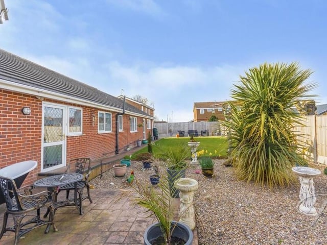 Imagine warm summer evenings or weekends relaxing with friends on this patio area at the back of the bungalow.