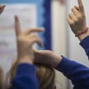 Department for Education figures show 14.6 per cent of pupils missed at least 10 per cent of sessions in the school year 2022-23. (Photo by: PA)