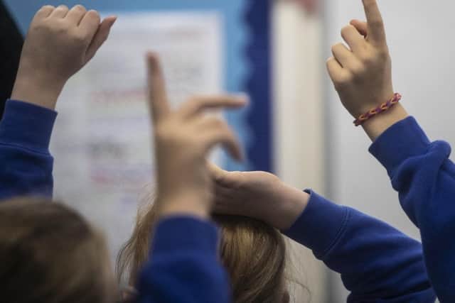 Department for Education figures show 14.6 per cent of pupils missed at least 10 per cent of sessions in the school year 2022-23. (Photo by: PA)