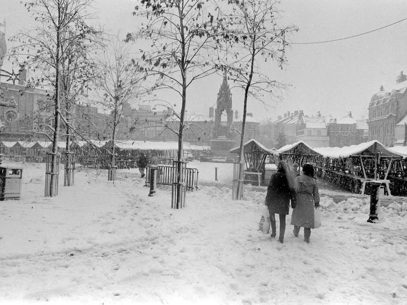 Walking through a snowy Mansfield scene.