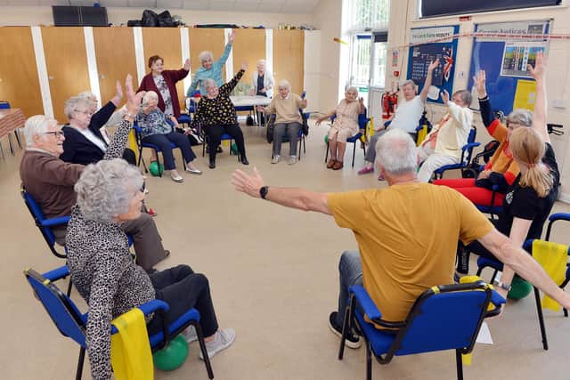 Movements to music with Julie Rose from move it or lose it.