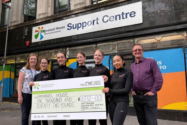 Notttingham Synchronized Skating Academy (NSSA) skaters hand over a cheque to Emmanuel House