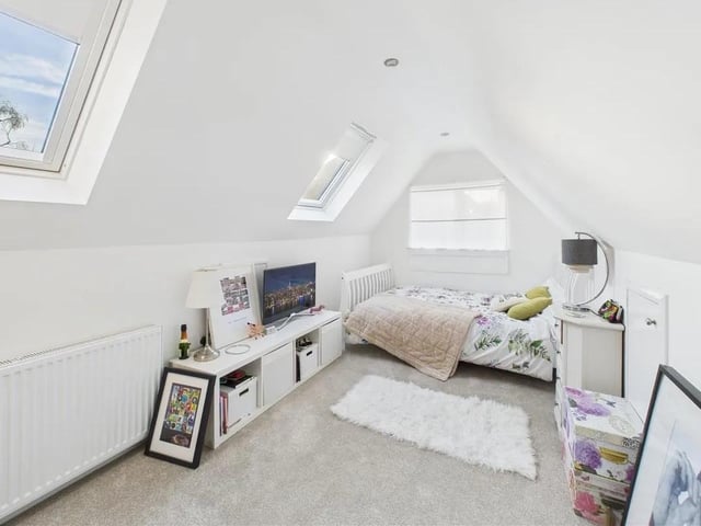 A beautiful double bedroom with dual aspect windows and two roof lights with the benefit of eaves storage.