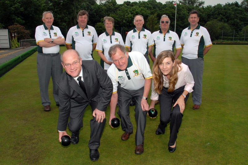 Members of Teversal Grange Bowls Club celebrate after they gained a shirt sponsor. Ken Gregory and Sons Funeral Directors supplied the club with new shirts. Pictured is Club Chairman Harry Johnson, centre, with Gregory Concultants Peter Gregory, left, and Helen Gregory, right, watched by club members.