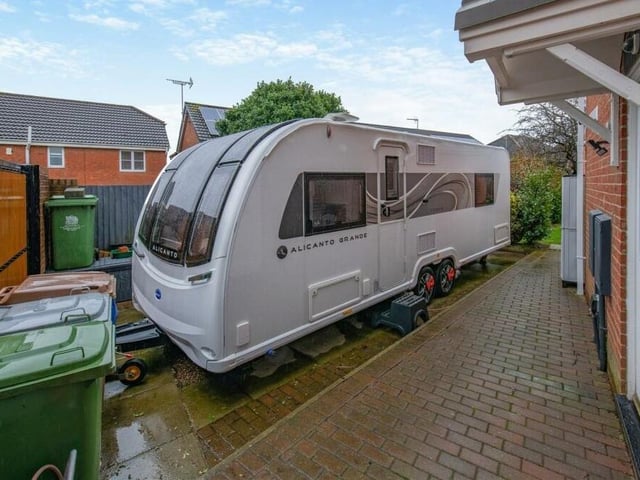If you own a caravan or a motorhome, this standing area at the side of the house is heaven-sent.