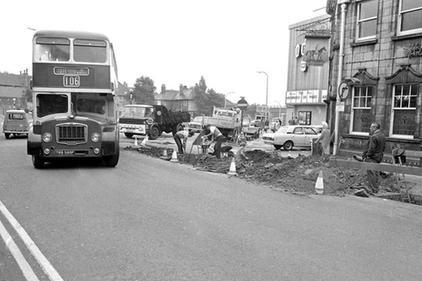 Work continues outside the old Horse & Jockey during the 70s.