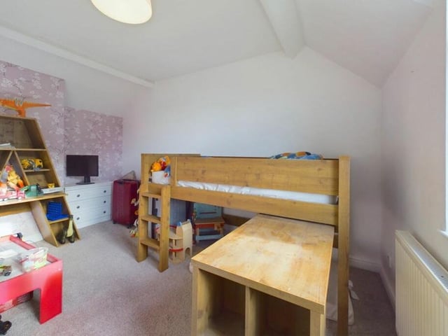 This bedroom is ideal for a young child.