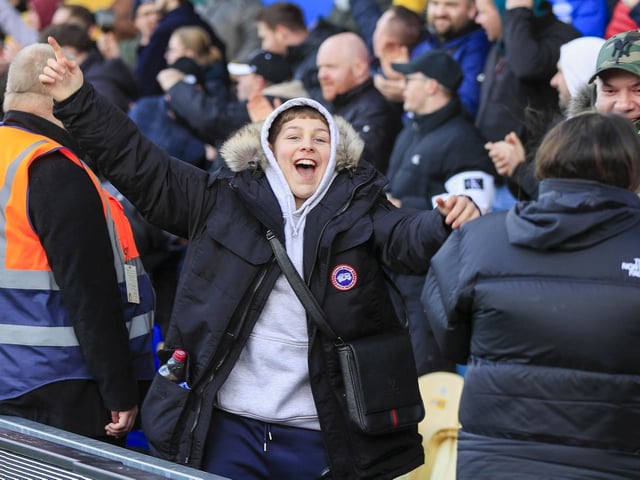 Mansfield Town fans ahead of the draw with Colchester United.